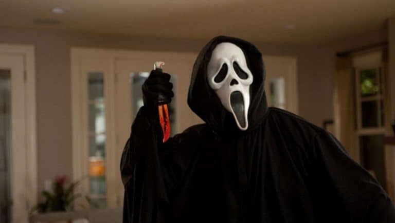 Scream - a picture of Ghostface (the killer) wearing a halloween mask and holding a bloody knife.