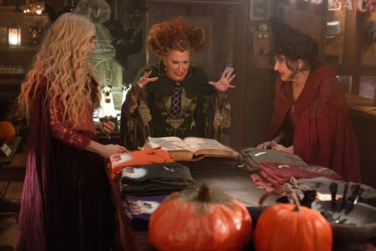(L-R): Sarah Jessica Parker as Sarah Sanderson, Bette Midler as Winifred Sanderson, Kathy Najimy as Mary Sanderson in HOCUS POCUS 2, exclusively on Disney+. Photo by Matt Kennedy. © 2022 Disney Enterprises, Inc. All Rights Reserved.