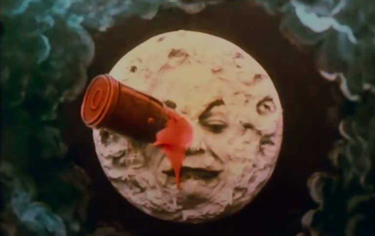 The moon with a rocket in its eyes in A Trip To The Moon (1902).