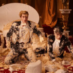 Nicholas Galitzine and Taylor Zakhar-Perez as Henry and Alex in Red, White & Royal Blue.