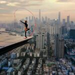 a woman does gymnastics on a rooftop in netflix doc skywalkers: a love story