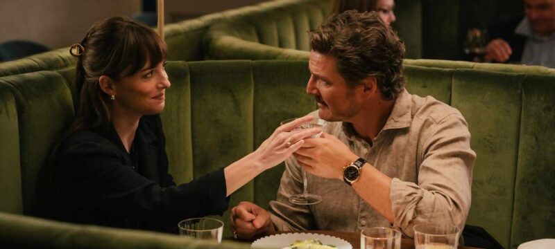 materialists pedro pascal and dakota johnson in a restaurant