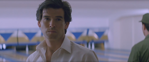 Pierce Brosnan goes ten pin bowling.