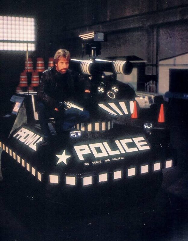 Chuck Norris in Code Of Silence, along with his co-star, the Prowler.