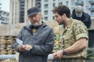 Director David Mackenzie (left) with Aaron Taylor-Johnson (right) on the London set of Fuze. Credit: StudioCanal.